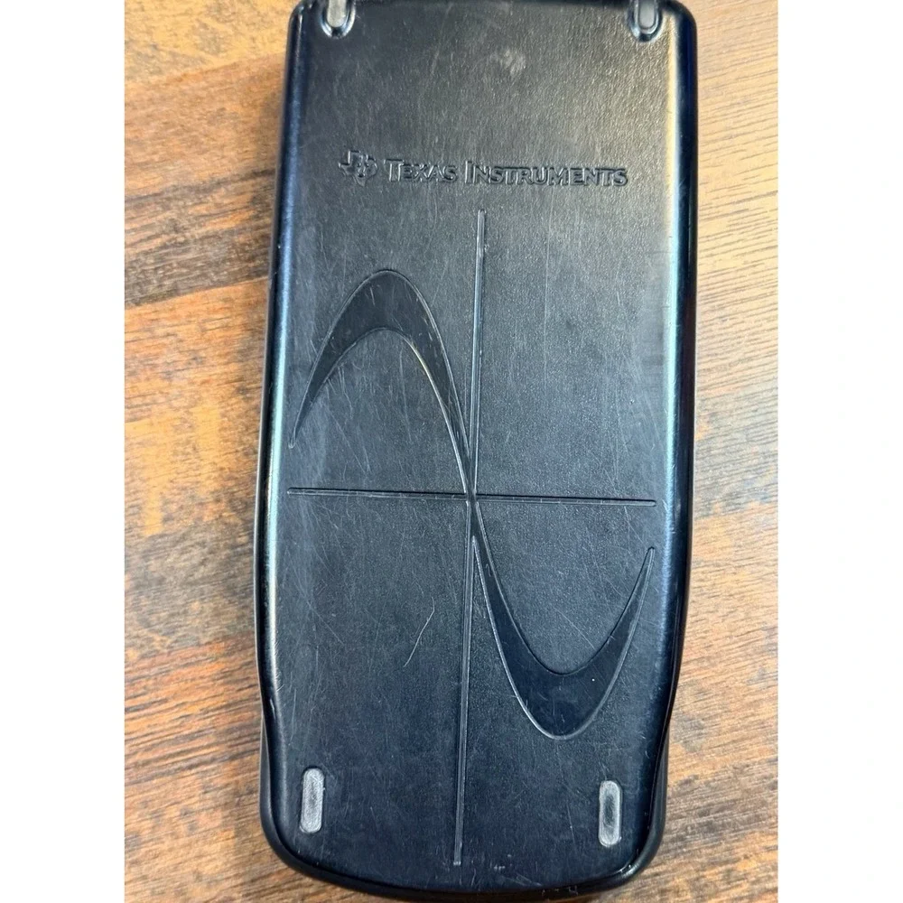 Texas Instruments TI-83 Plus graphing calculator with cover.  1999. Tested